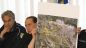 Il Presidente del Consiglio, Silvio Berlusconi, illustra la mappa delle zone colpite - foto: www.protezionecivile.it