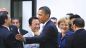 Nella foto, Barack Obama, Angela Merkel, Silvio Berlusconi, il primo ministro Taro Aso e Jose Barroso - foto corriere.it