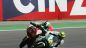 Nella foto, la scivolata di Andrea Iannone che coinvolge Pol Espargaro all'ultima curva del GP di Misano