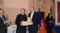 Mons. Bruno Forte consegna il discobolo d'oro a Giuseppe Forte l'assistente nazione del CSI don Alessio