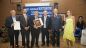 I rappresentanti del Rotary Club con il vincitore Dima