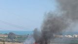 L'incendio divampato vicino al Villaggio Siv