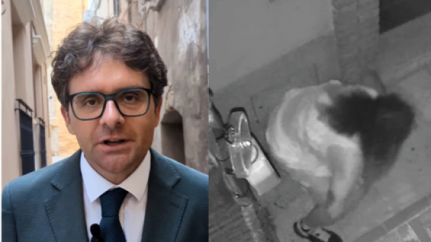 Mena e l'immagine ripresa da una telecamera nel centro storico